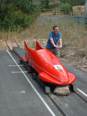 Ken push starts a bobsled