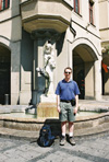 Ken in front of statue